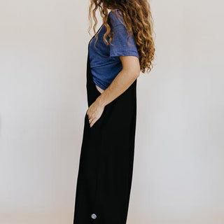 Wings Hawaii model wearing Sun Pocket Overalls in Black
