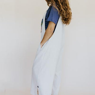 Wings Hawaii model wearing Sun Pocket Overalls in Sand