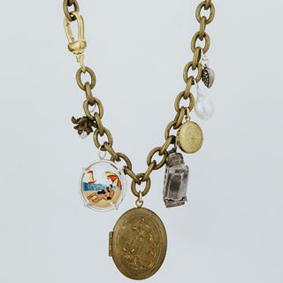 Wings Hawaii charm necklace with steamboat charm and locket