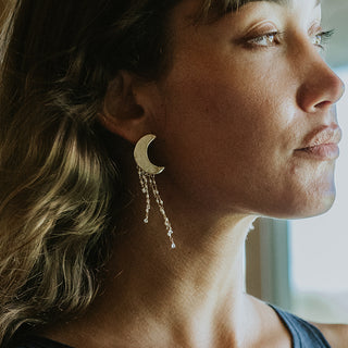 14K Yellow Gold Carved moon studs with diamonds and baroque pearls hanging from them