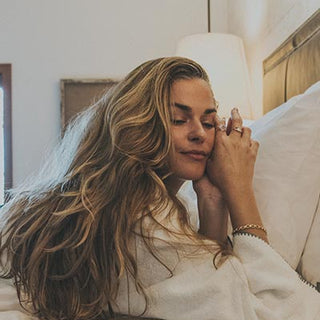 Model wearing Wings Hawaii Chain Reaction Bracelet in gold fill