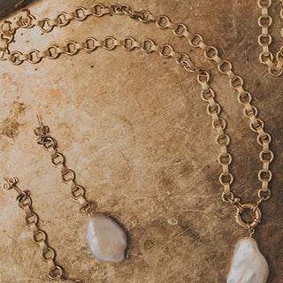 Wings Hawaii Chain Reaction Pearl Earrings and necklace