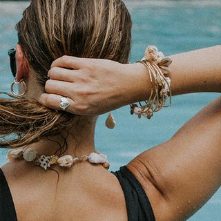 Model wearing Wings Hawaii Diamond Heart Ring - Sterling silver and 14k gold with diamond