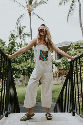 Wings Hawaii model wearing Sun Pocket Overalls in Sand