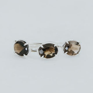 Three oval-cut Smoky Quartz gemstone rings, prong-set in Sterling Silver