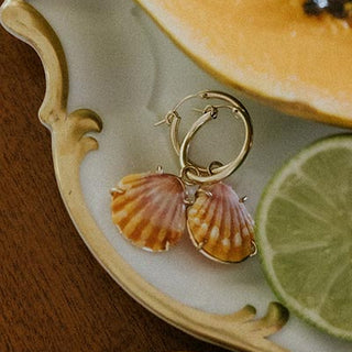 Charm hoop earrings adorned with Hawaiian sunrise shells in gold