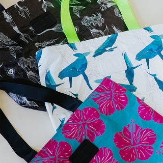 Collection of three Wings Hawaii adventure tote bags