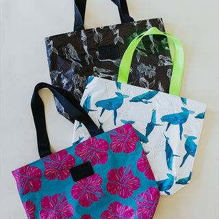 Collection of three Wings Hawaii adventure tote bags