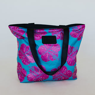 Wings Hawaii foldable Tyvek adventure bag in hibiscus print
