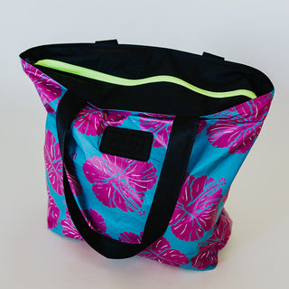 Wings Hawaii foldable Tyvek tote bag in hibiscus print
