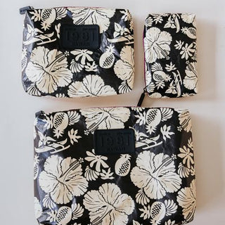 wings hawaii tyvek adventure pouches in black + tan aloha print