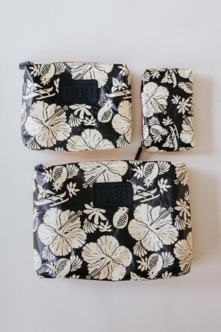 wings hawaii tyvek adventure pouches in black + tan aloha print
