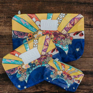 wings hawaii tyvek adventure pouches in sun + moon collage print