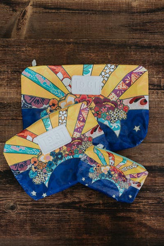 wings hawaii tyvek adventure pouches in sun + moon collage print