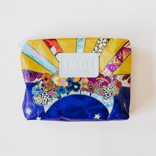 wings hawaii tyvek adventure pouches in sun + moon collage print