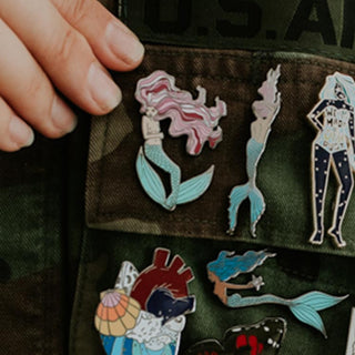 Wings Hawaii enamel pins on jacket