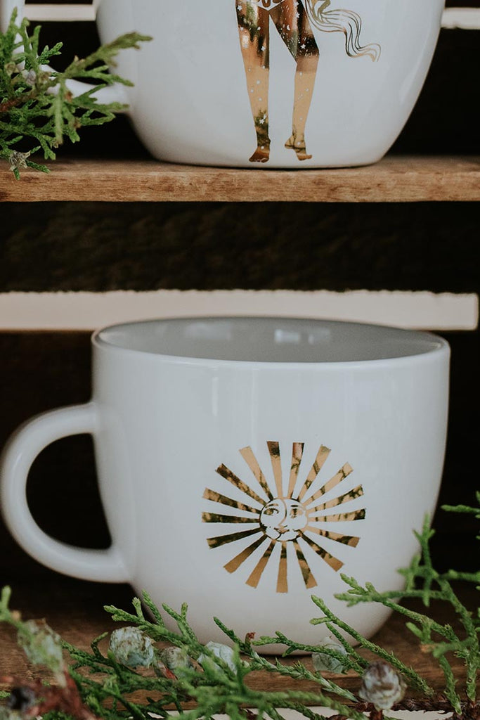 sun and moon gold decal on a white ceramic mug wings hawaii