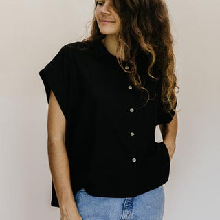 Wings Hawaii model wearing Classic Black Boxy Button-up