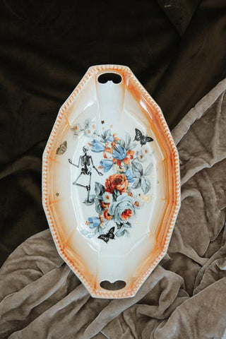 wings hawaii dancing skeleton serving dish 