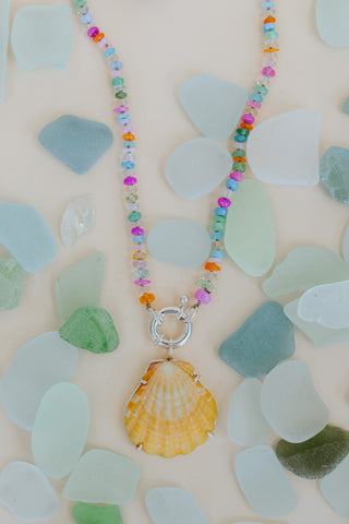 Wings Hawaii Symphony necklace with colorful beaded opals and Hawaiian Sunrise Shell pendant set in sterling silver. 