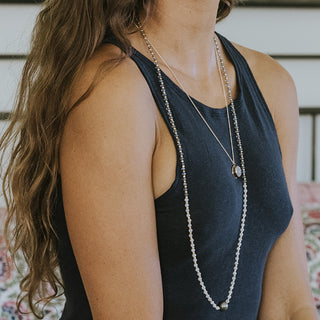 30" Beaded necklace with labradorite, moonstone beads and a large Tahitian pearl