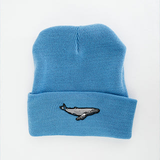 light blue fold over beanie with humpback whale patch