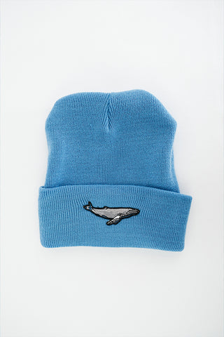 light blue fold over beanie with humpback whale patch