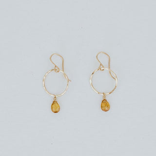 hammered hoop with dangling zicron bead earring