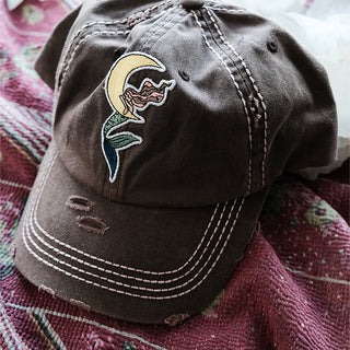 distressed baseball cap with dreaming mermaid on the moon patch