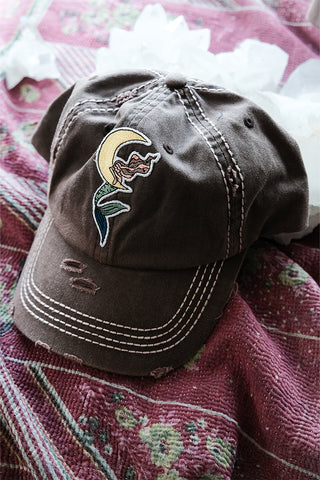 distressed baseball cap with dreaming mermaid on the moon patch