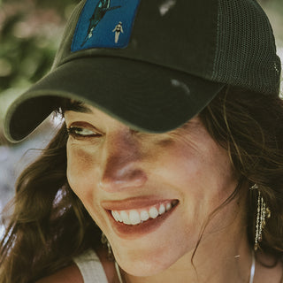 trucker cap with what and diver embroidered patch