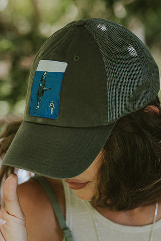 trucker cap with what and diver embroidered patch