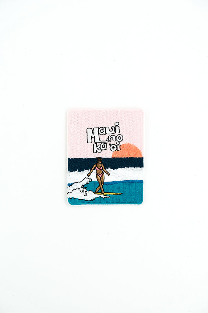 Girl surfing with Maui no ka oi text embroidered patch