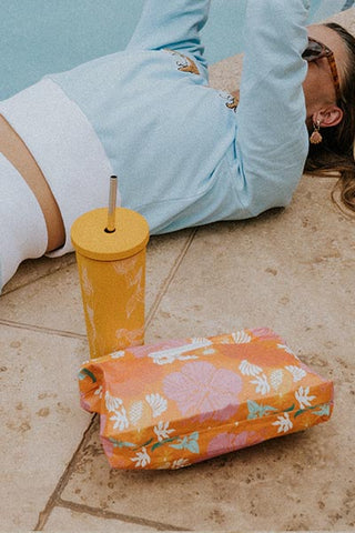 Wings Hawaii foldable adventure pouch in orange aloha print
