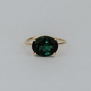 Prong set green tourmaline in 14K Yellow gold ring