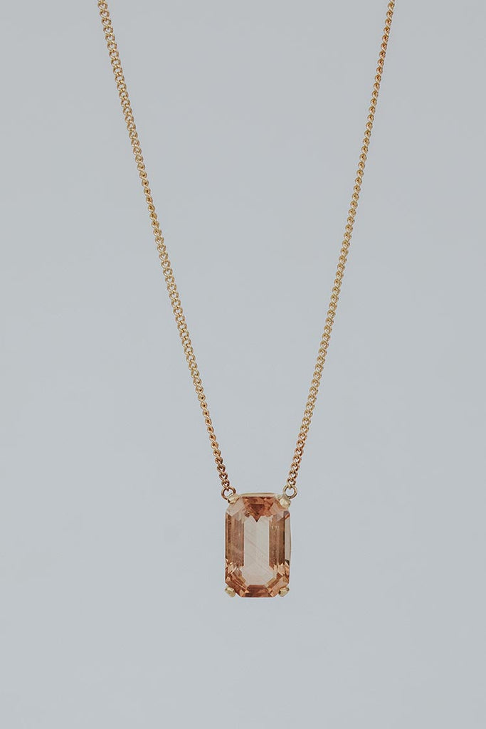 radiant cut pink sunstone prong set on delicate chain necklace 14K Yellow Gold