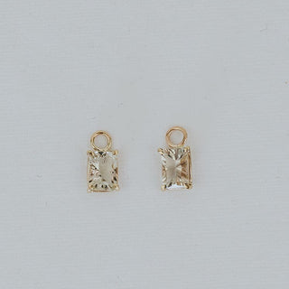 14K Yellow gold clasping hoop earrings with square cut prong set sunstone