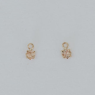 Sunstone prong set on clasping hoop 14K Yellow Gold