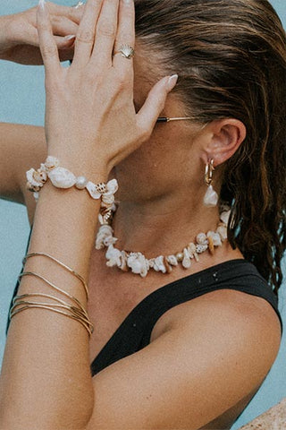 model wearing Wings Hawaii Bombucha Pearl Endless Hoops