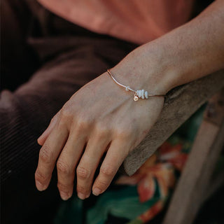Hawaiian 14Kg gold bangle with puka shells