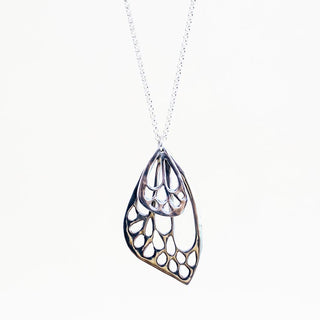 small and large butterfly wing made of sterling silver hanging on silver chain necklace