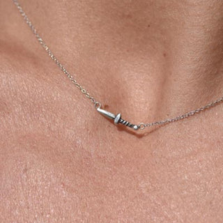 tiny dagger set on sterling silver chain