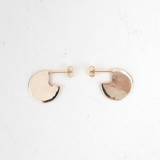 Womens stud earrings in the shape of disks