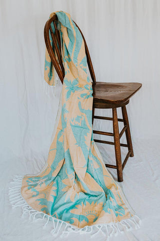 turkish towel blanket with teal and yellow banana patch print