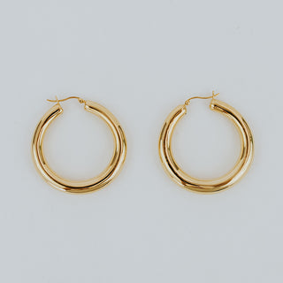 Thick 14K Yellow Gold clasping circle hoop earrings