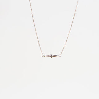 tiny dagger set horizontal on fine chain