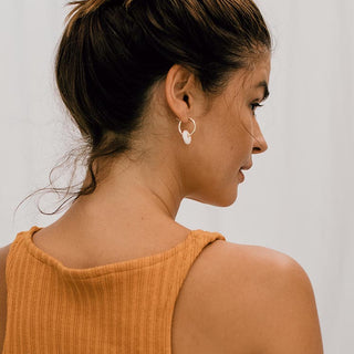 puka shell hoop earrings on gold filled wire women's jewelry beachy boho mermaid style casual and chic hand made in haiku maui wings hawaii