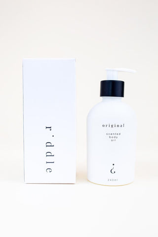 riddle body oil. original scent. pump bottle