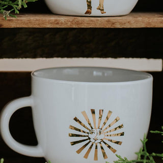 sun and moon gold decal on a white ceramic mug wings hawaii