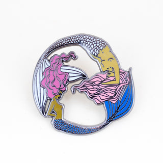 enameled pin of two mermaids. pisces symbol